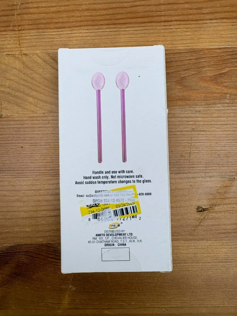 Set of two stylish pink glass spoons for coffee, tea, or cocktails. New